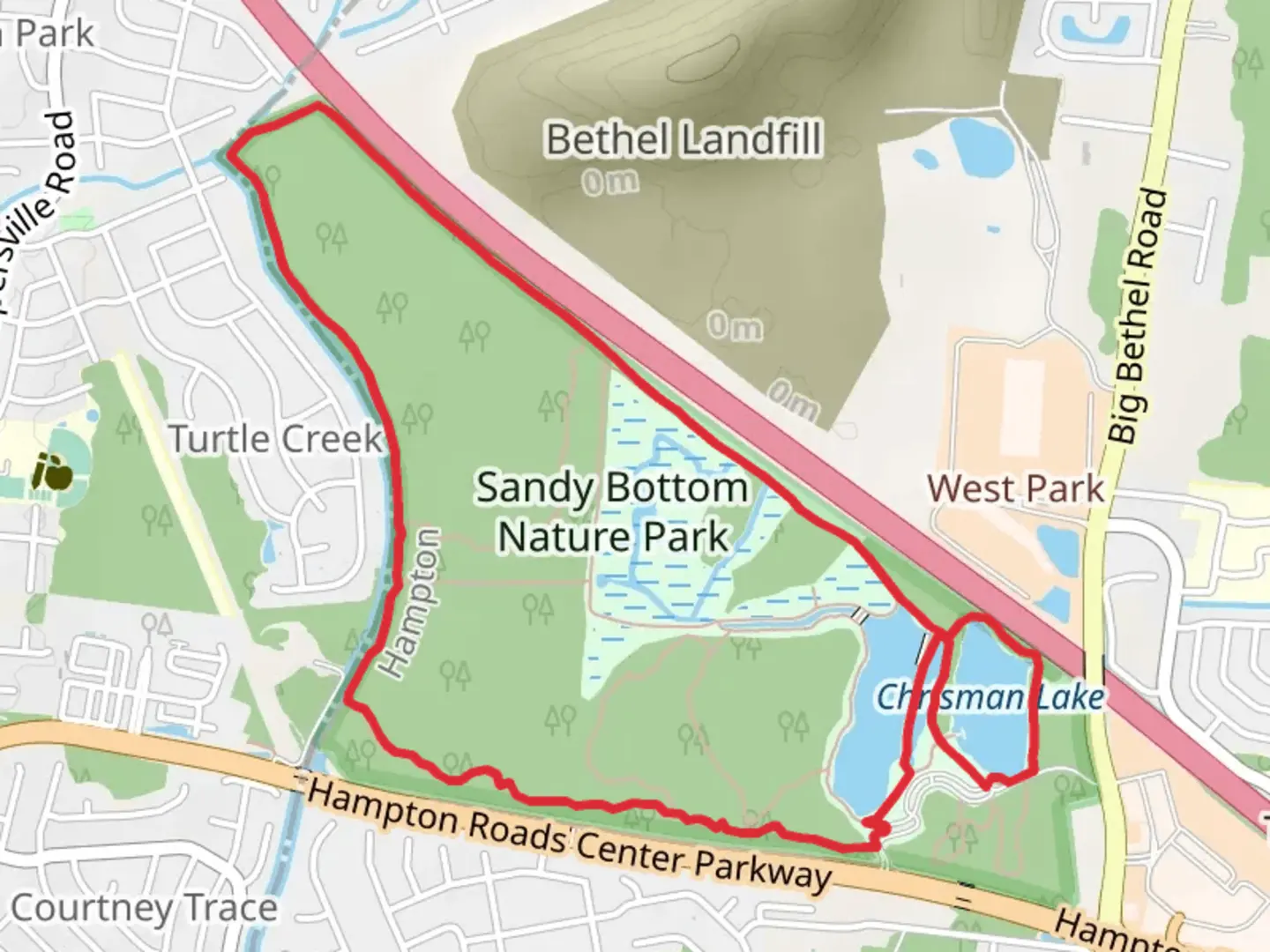 An image depicting the trail Chrisman Lake - Sandy Bottom Nature Park Loop and its surrounding area.