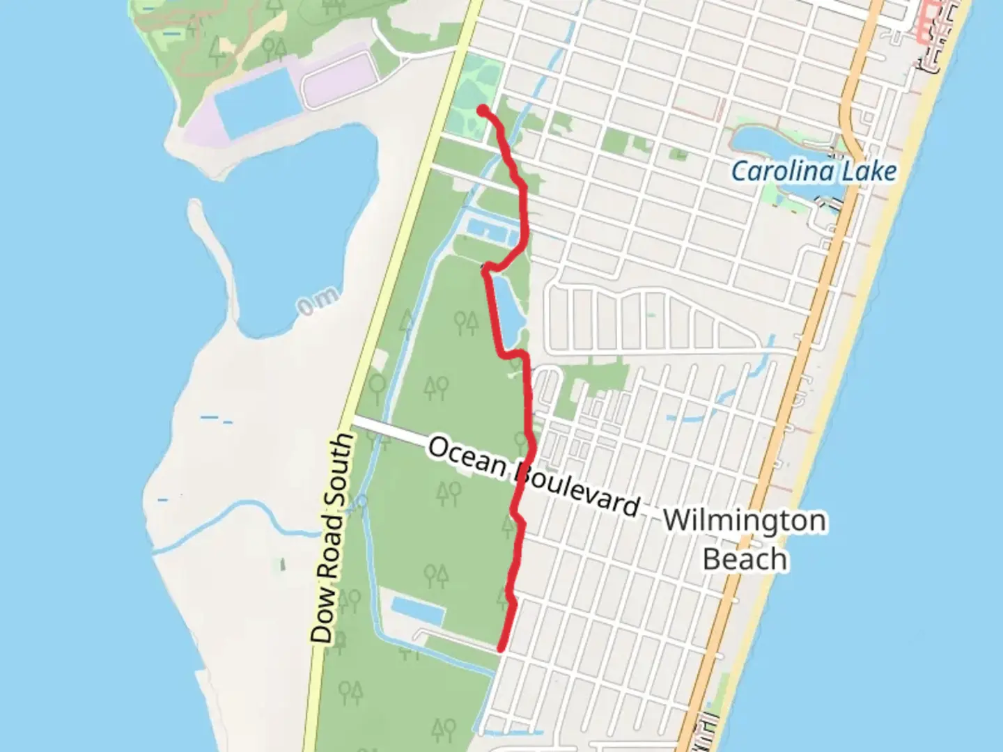 An image depicting the trail Carolina Beach Island Greenway and its surrounding area.