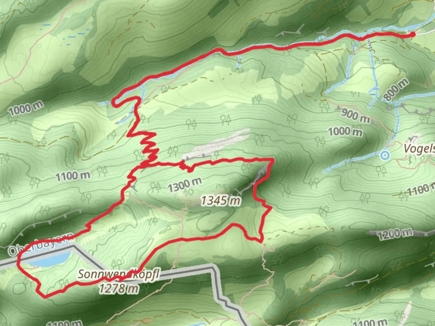An image depicting the trail Sonnwendköpfl and Taubensee Loop via Luftbodensteig and its surrounding area.