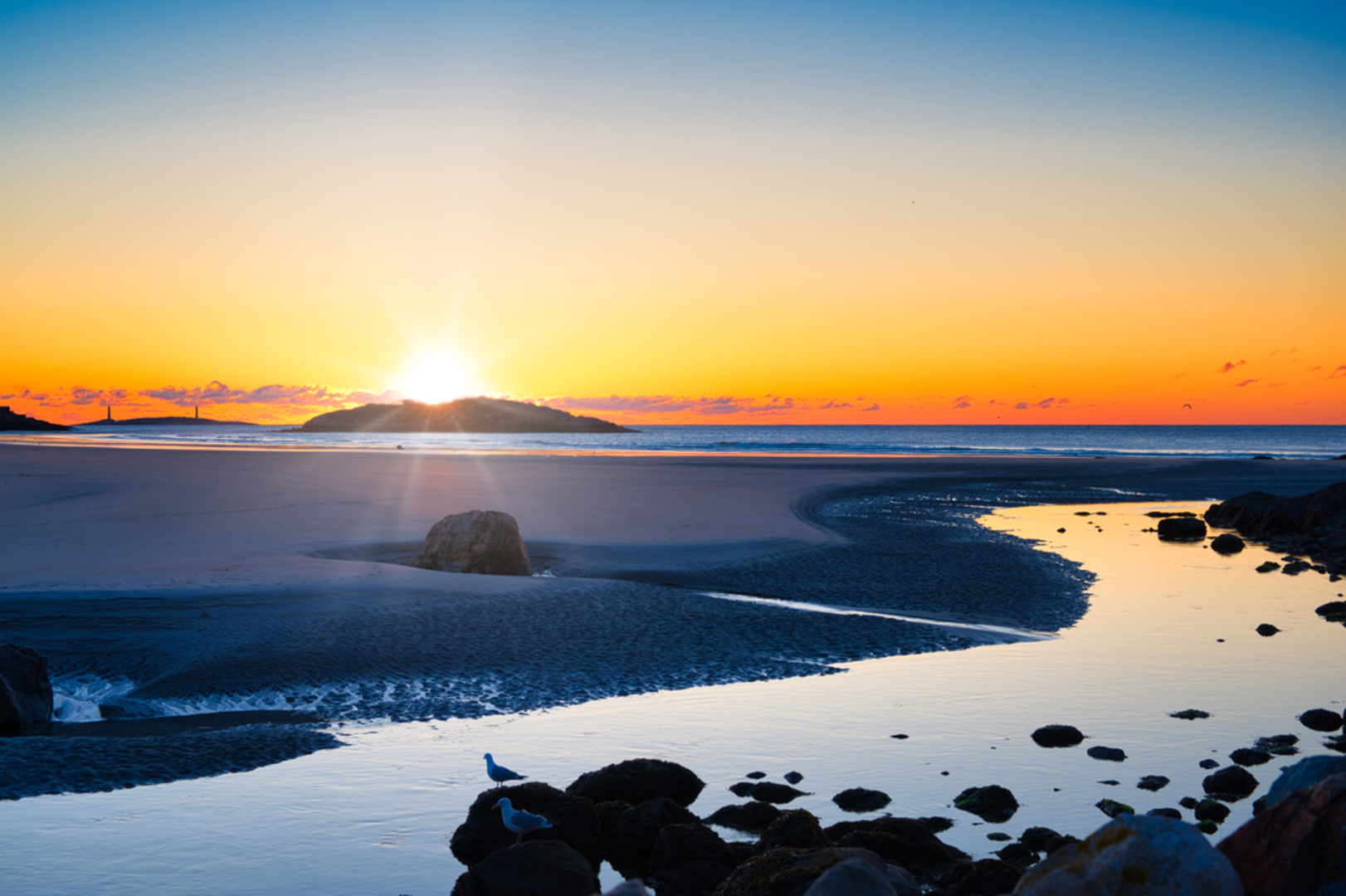 An image depicting the trail Good Harbor Beach to Salt Island Trail and its surrounding area.