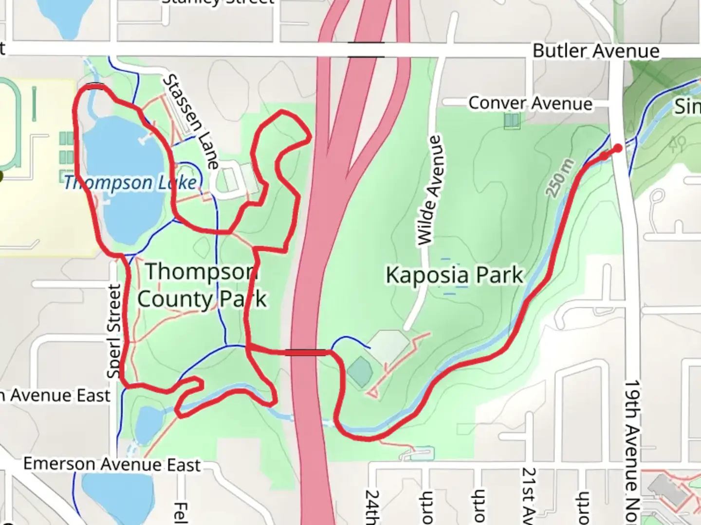 An image depicting the trail Thompson Lake Loop via River to River Greenway and its surrounding area.