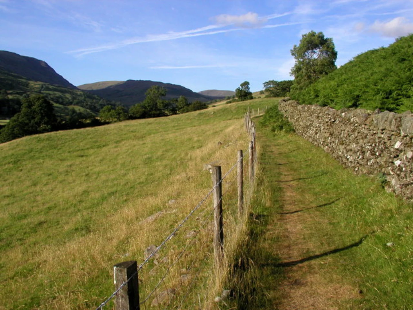 An image depicting the trail Stockghyll Force Waterfall, Wansfell Pike and Skelghyll Wood Loop and its surrounding area.