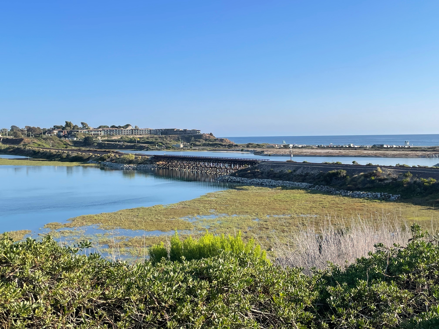 An image depicting the trail Encinitas Creek from Calle Barcelona and its surrounding area.
