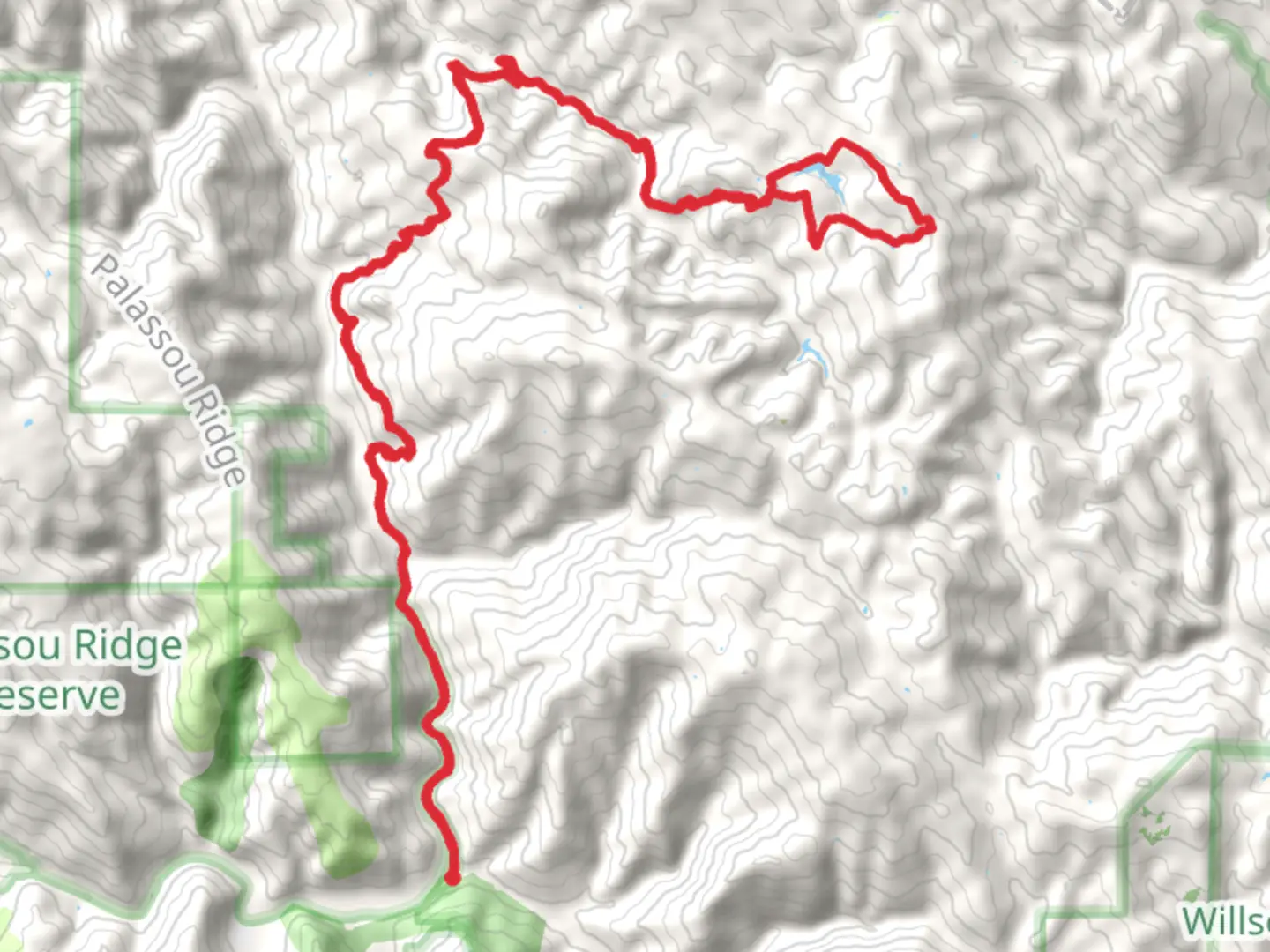 An image depicting the trail Coit Lake Loop and its surrounding area.
