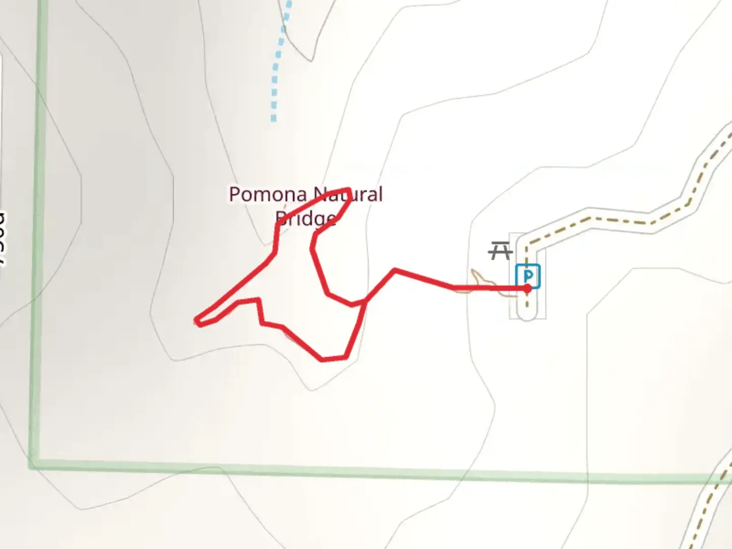 An image depicting the trail Pomona Natural Bridge Loop Trail and its surrounding area.