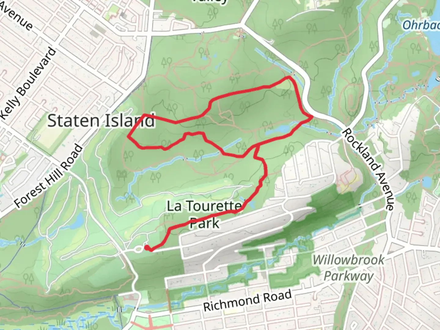 An image depicting the trail Greenbelt Red -Blue Trail and its surrounding area.