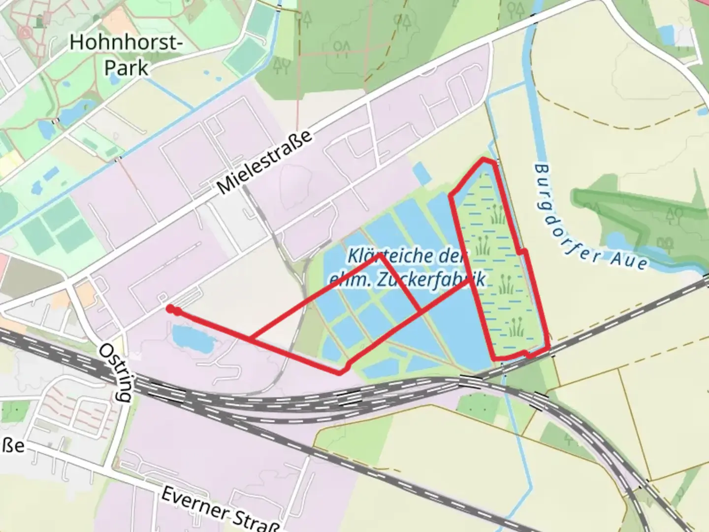 An image depicting the trail Klärteiche der ehm Zuckerfabrik Loop via Industriestraße and its surrounding area.