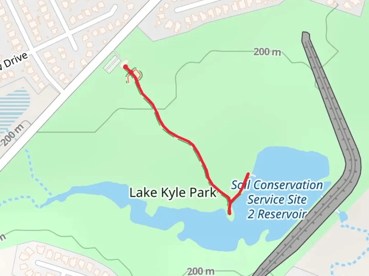 An image depicting the trail Lake Kyle Park and its surrounding area.