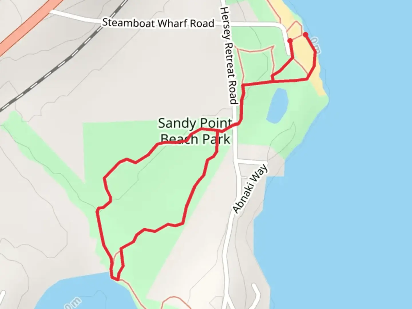 An image depicting the trail Sandy Point Loop and its surrounding area.