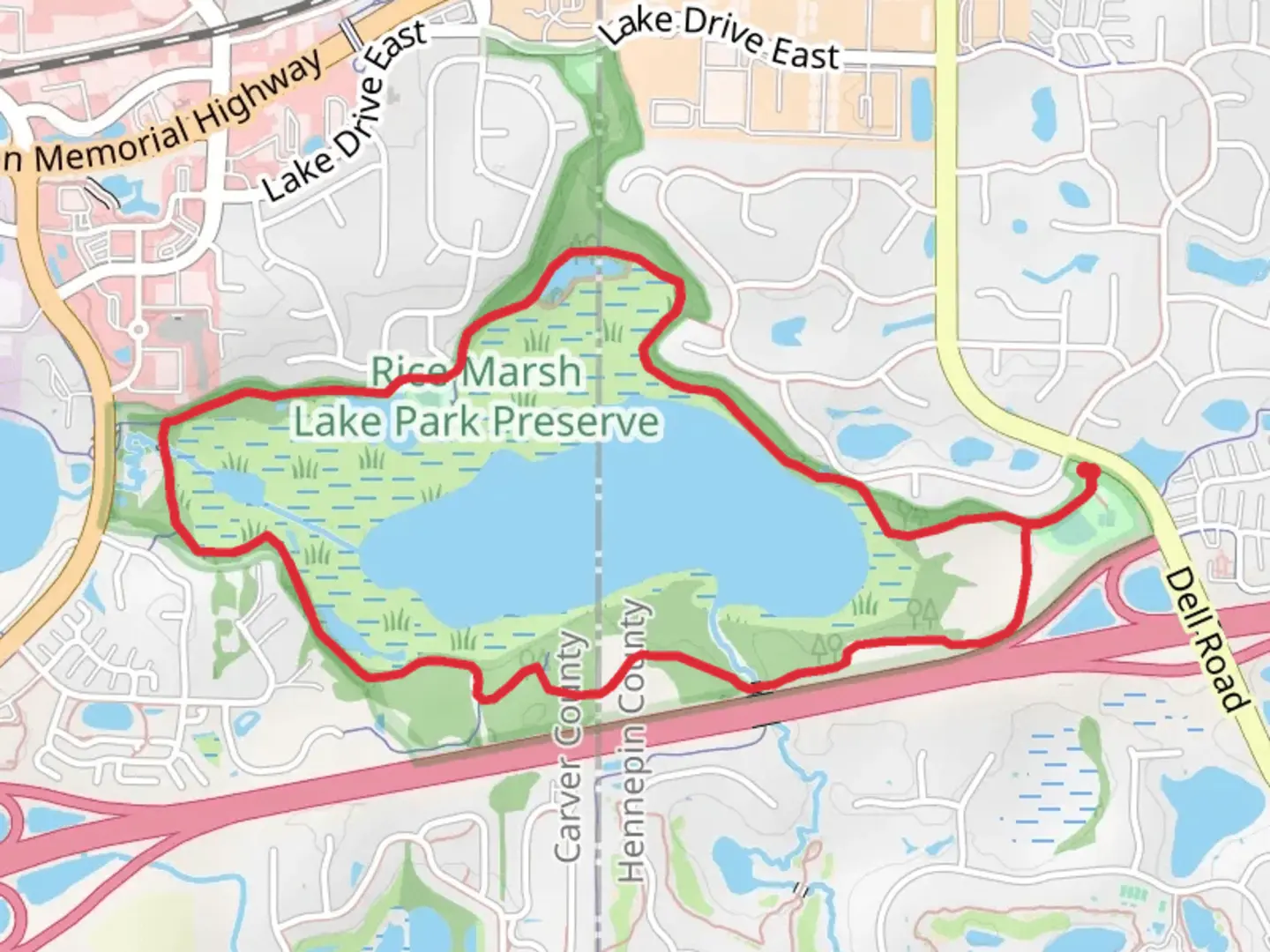 An image depicting the trail Rice Marsh Lake and its surrounding area.