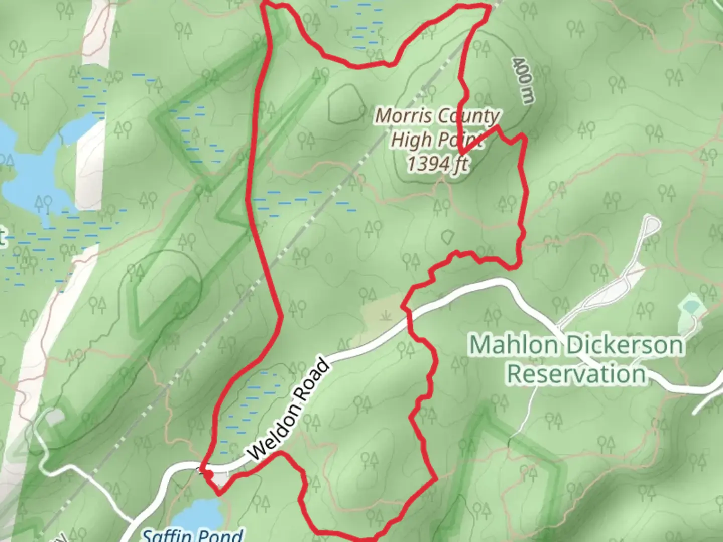 An image depicting the trail Green, White and Yellow Dot Loop Trail and its surrounding area.