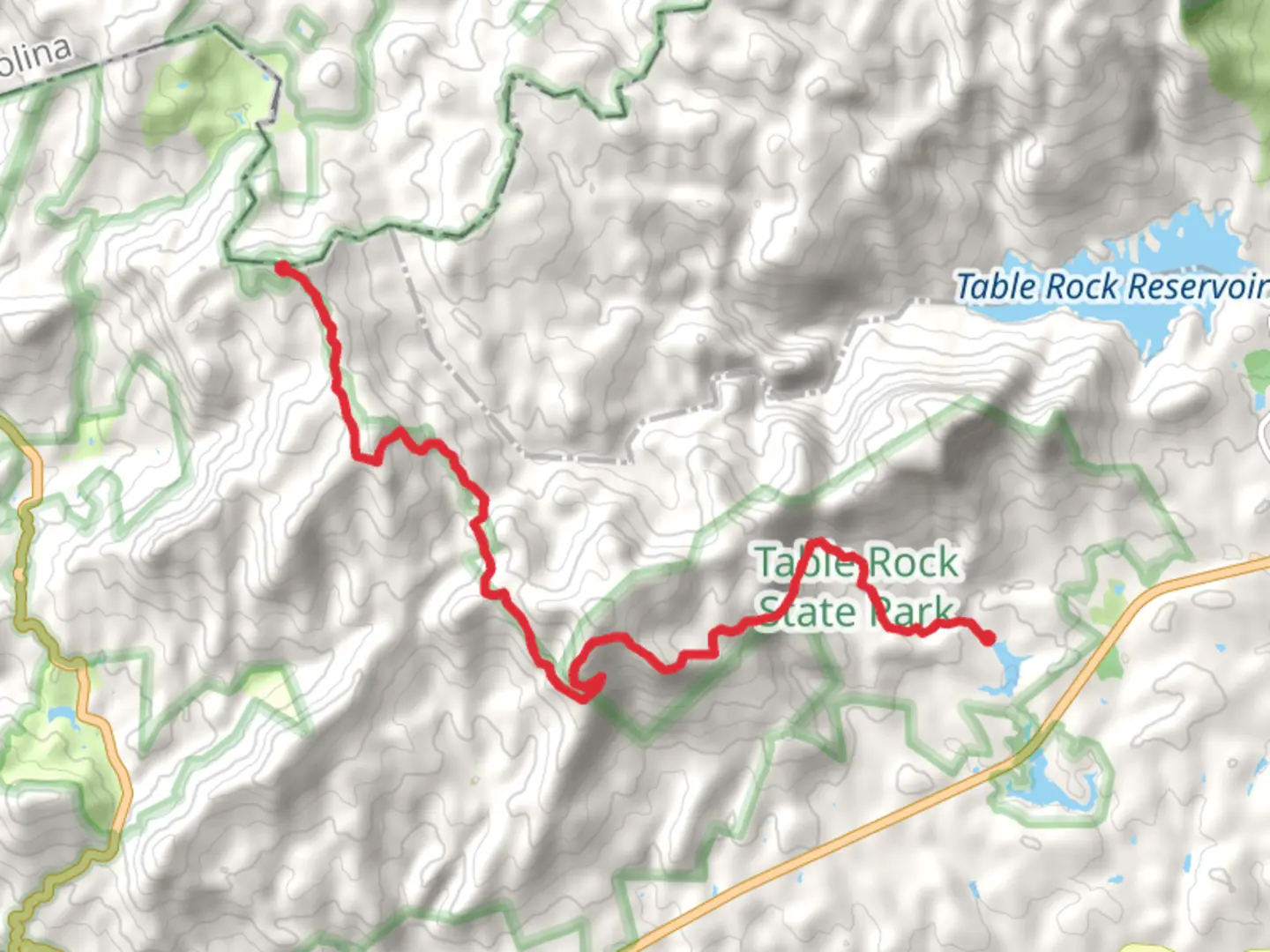 An image depicting the trail Hickorynut Mountain and Pinnacle Mountain via Foothills Trail and its surrounding area.