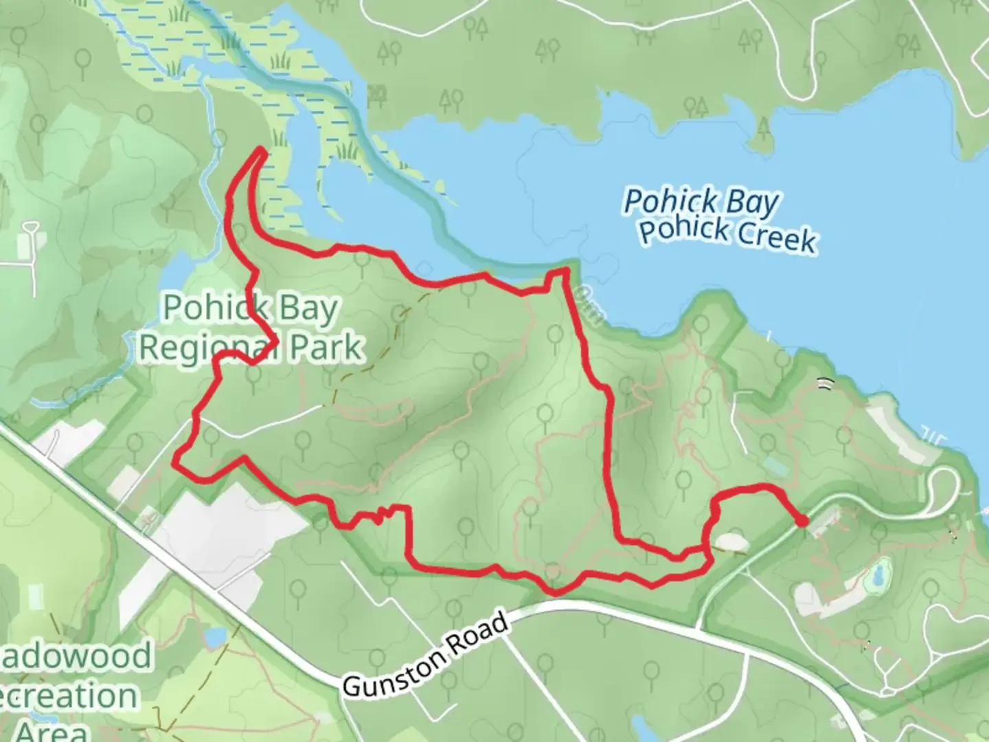 An image depicting the trail Red Loop Trail - Pohick Bay Drive and its surrounding area.