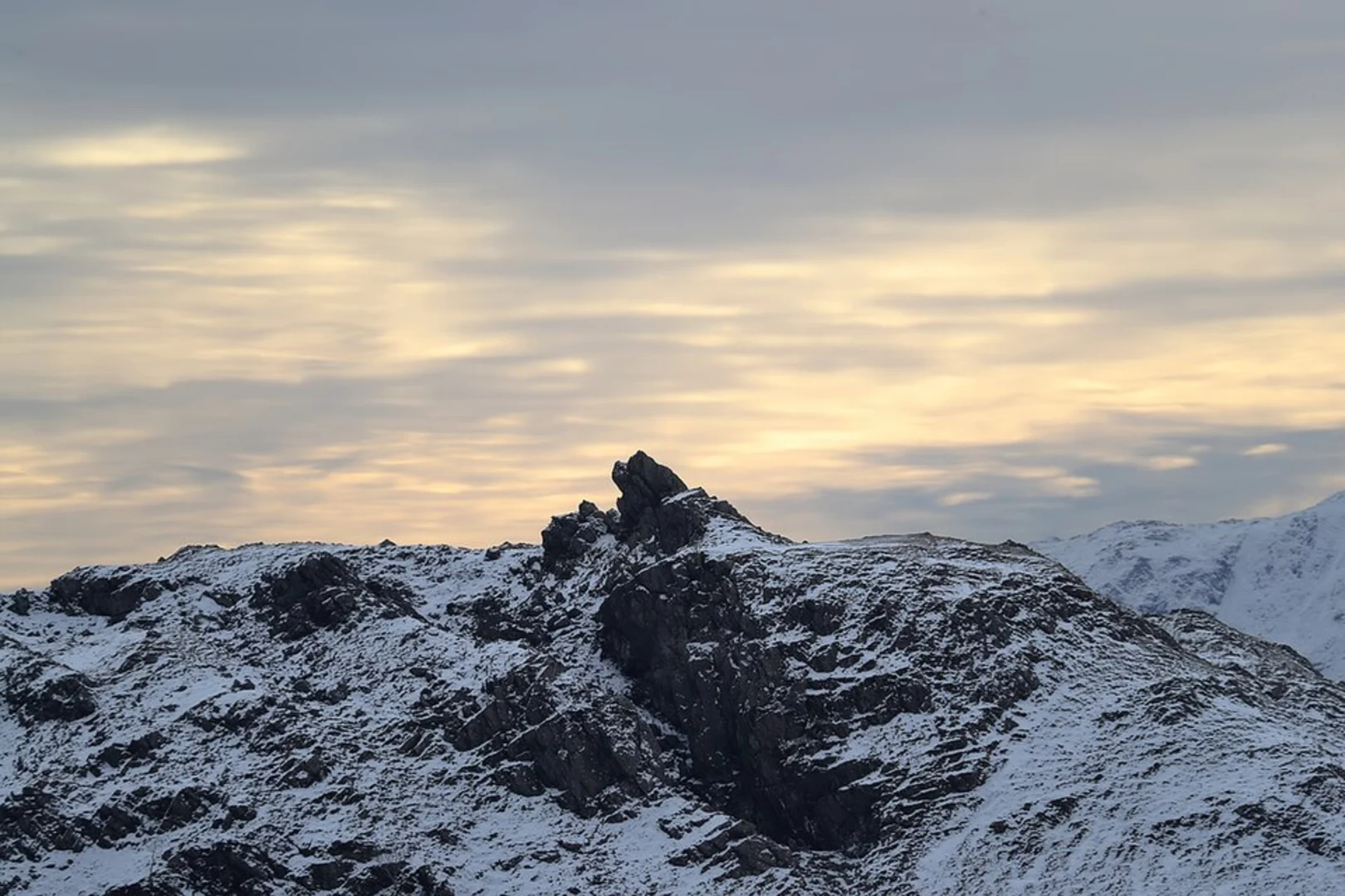 An image depicting the trail Moment Crag, Gibson Knott and Helm Crag Loop - High Broadrayne and its surrounding area.