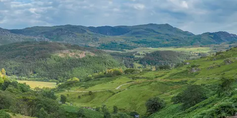 An image depicting the trail Snowdon via the Watkin Path and South Ridge and its surrounding area.