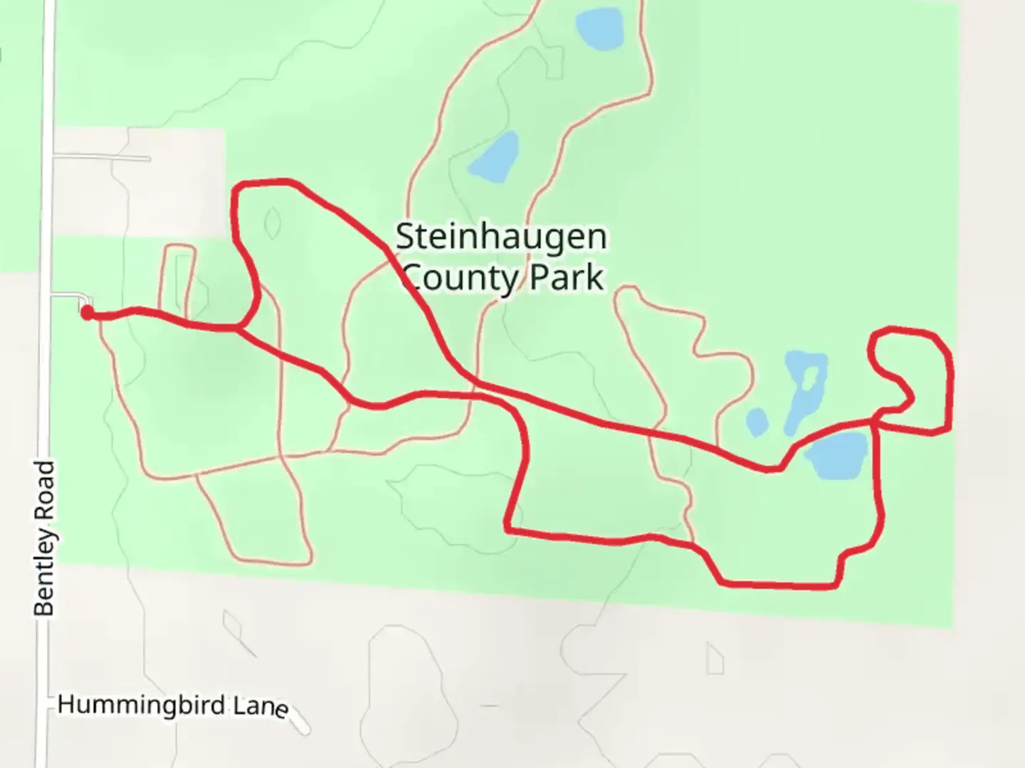 An image depicting the trail Steinhaugen County Park Loop and its surrounding area.