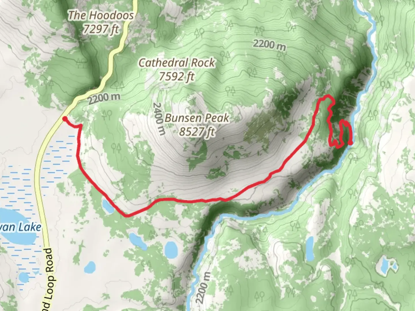 An image depicting the trail Osprey Falls via Old Bunsen Peak Road and its surrounding area.