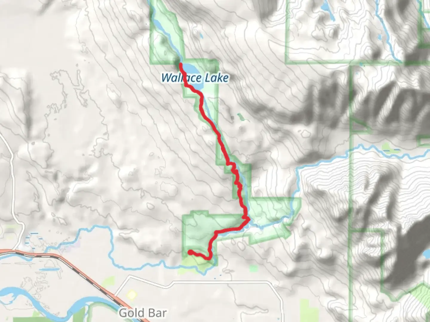 An image depicting the trail Wallace Lake via Greg Ball Trail and its surrounding area.