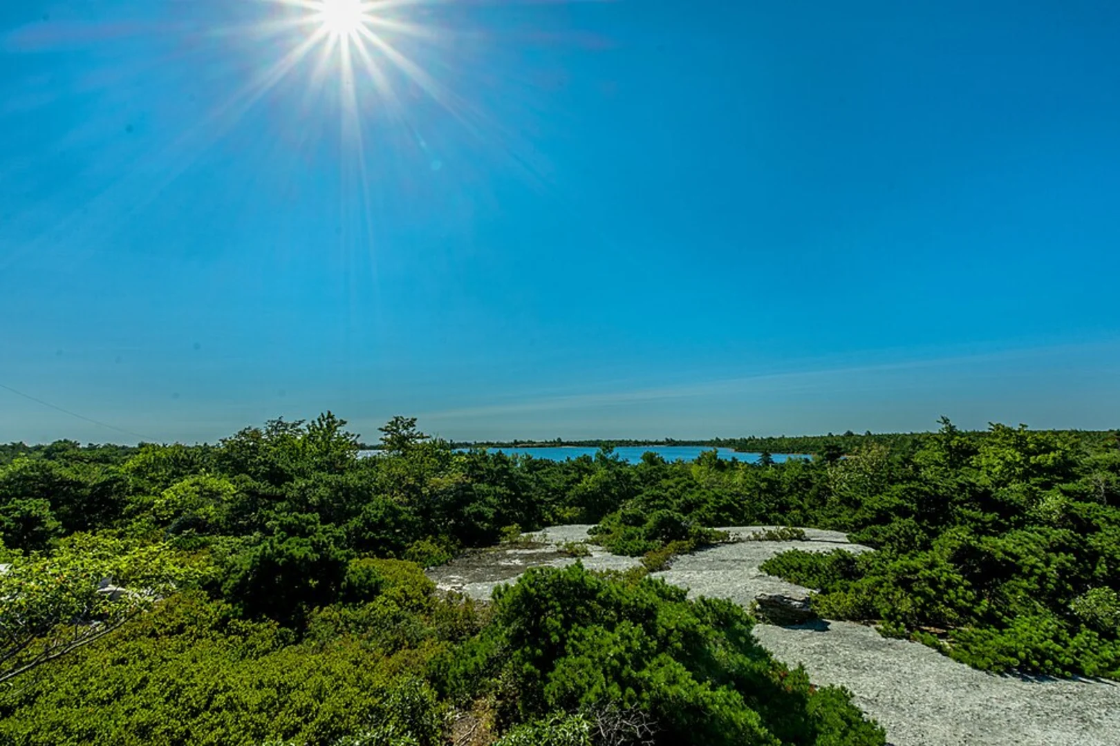 An image depicting the trail High Point and Lake Maratanza from Sams Point Road and its surrounding area.