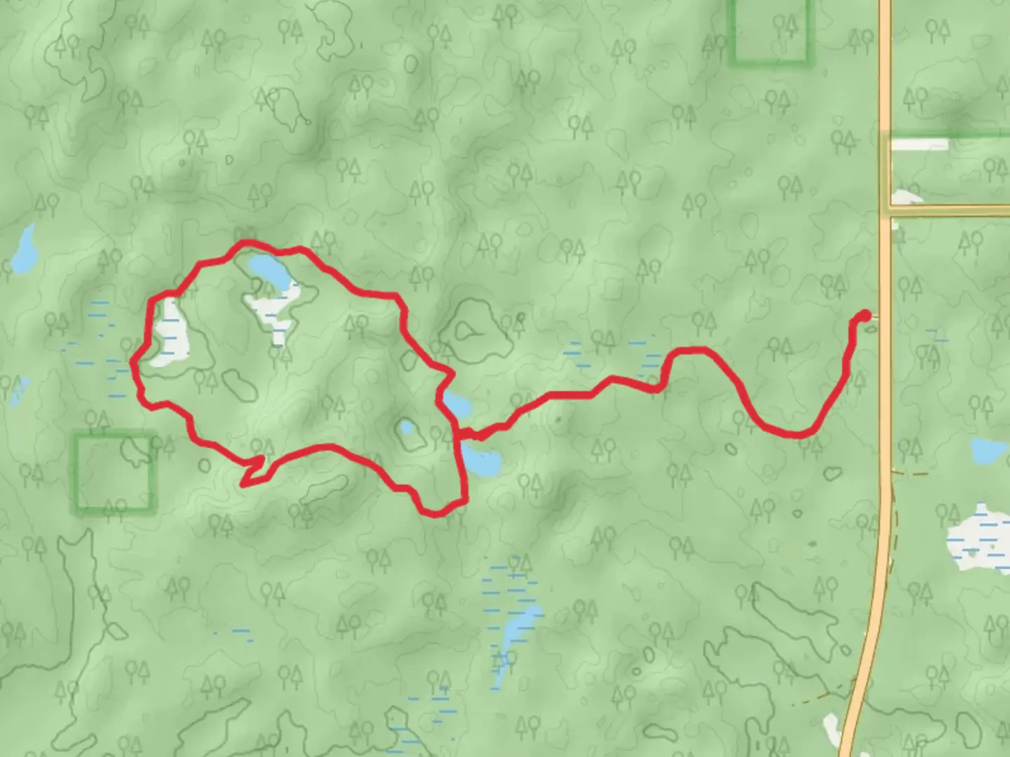 An image depicting the trail Penoyer and Hoist Lakes Trail and its surrounding area.