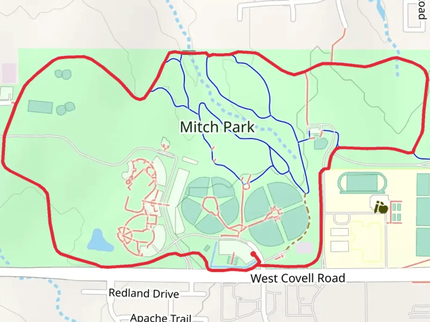An image depicting the trail Mitch Park - Main Loop Trail and its surrounding area.