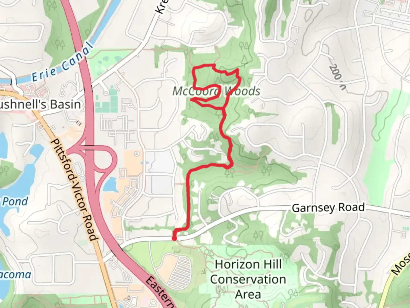 An image depicting the trail Mc Coord Woods - Crescent Trail and its surrounding area.