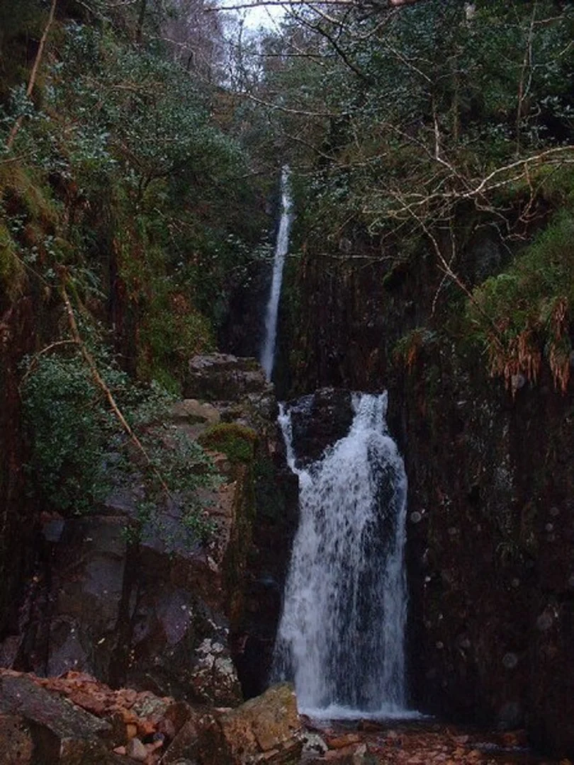 An image depicting the trail Scale Force Waterfall and Crummock Water Loop and its surrounding area.