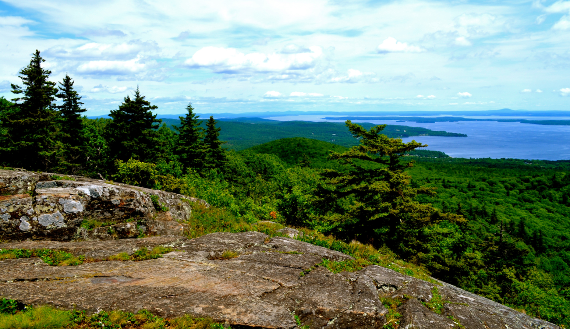 An image depicting the trail Megunticook Lake via Blue Trail and its surrounding area.