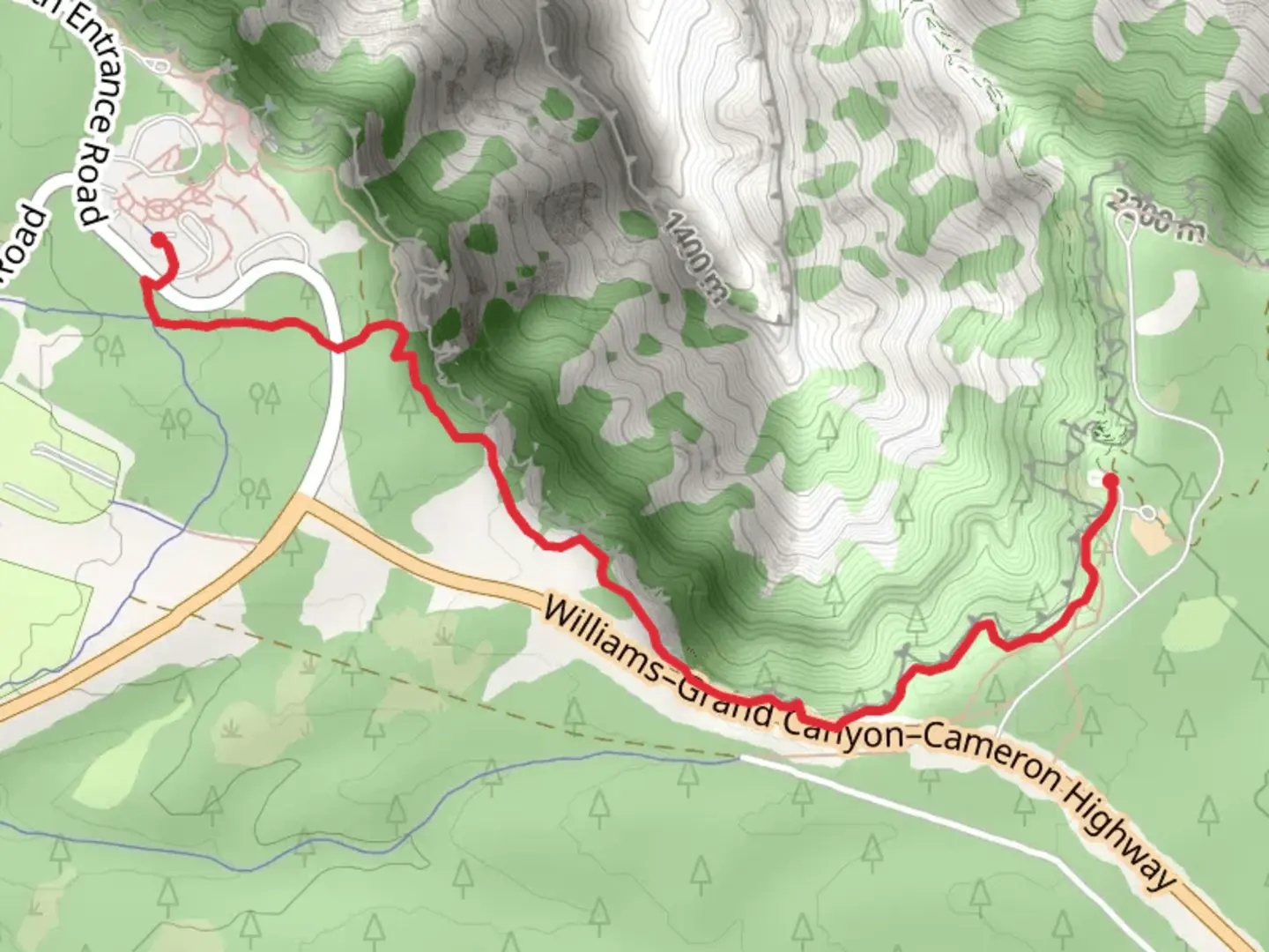 An image depicting the trail Greenway-Rim Trail and its surrounding area.
