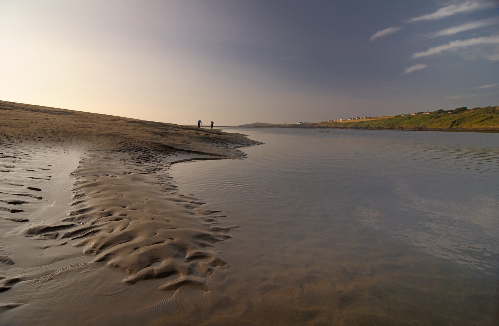 An image depicting the trail Cwm yr Esgyr and Cemaes Head from Poppit Sands and its surrounding area.