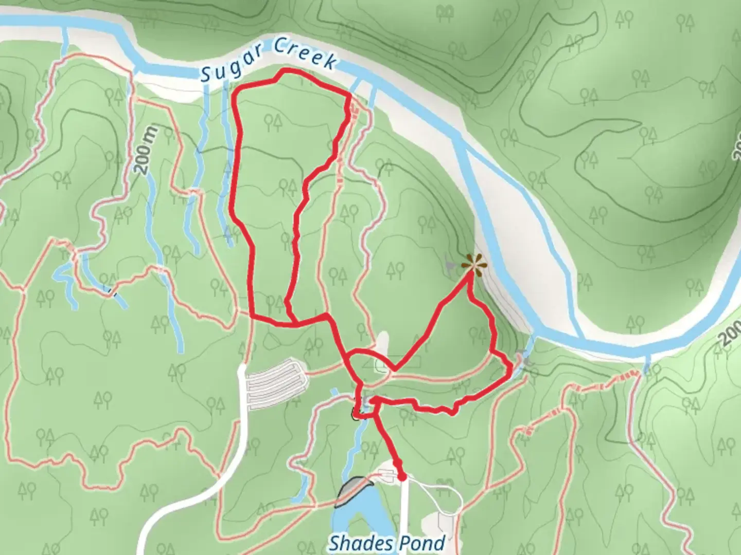 An image depicting the trail Trail 1 and 4 Loop - Shades Pond and its surrounding area.