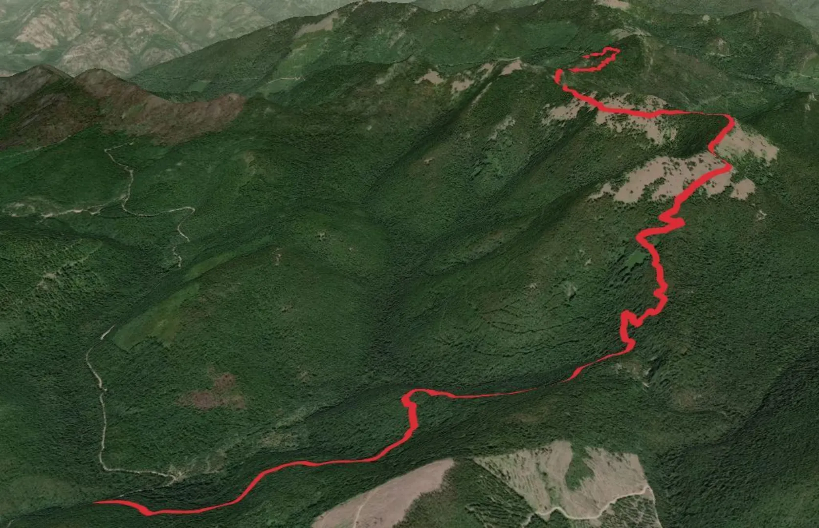 An image depicting the trail Pass Creek - Grassy Top Trail and its surrounding area.