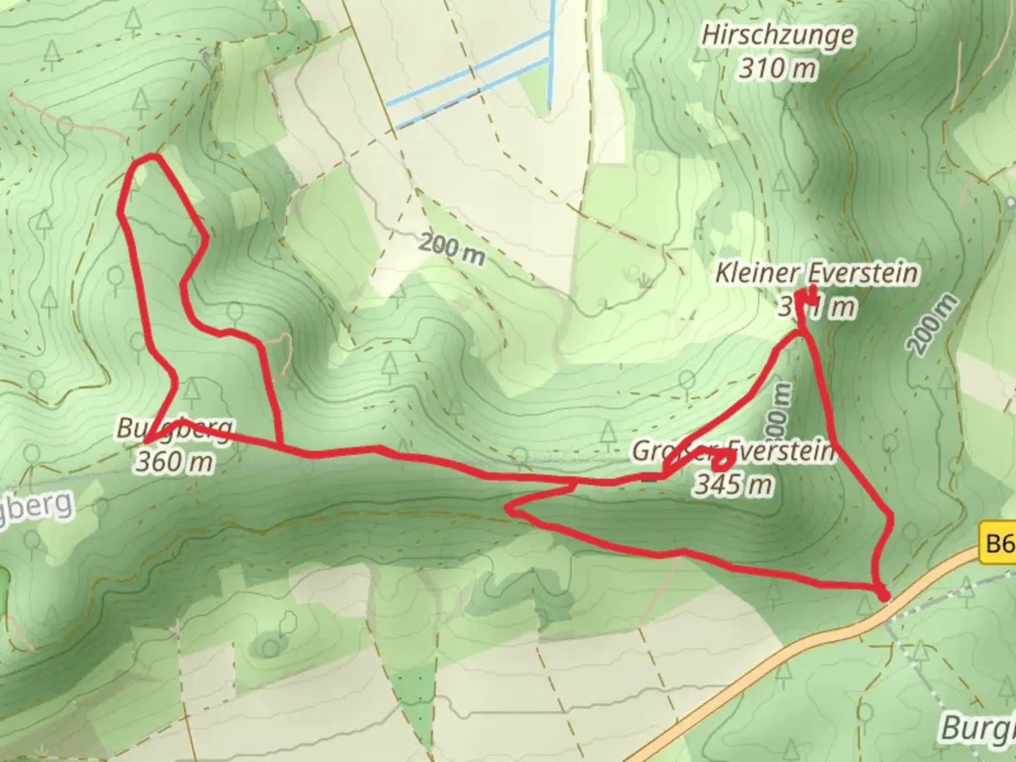 An image depicting the trail Kleiner Everstein, Großer Everstein and Burgberg Loop via Wanderweg X28 and its surrounding area.