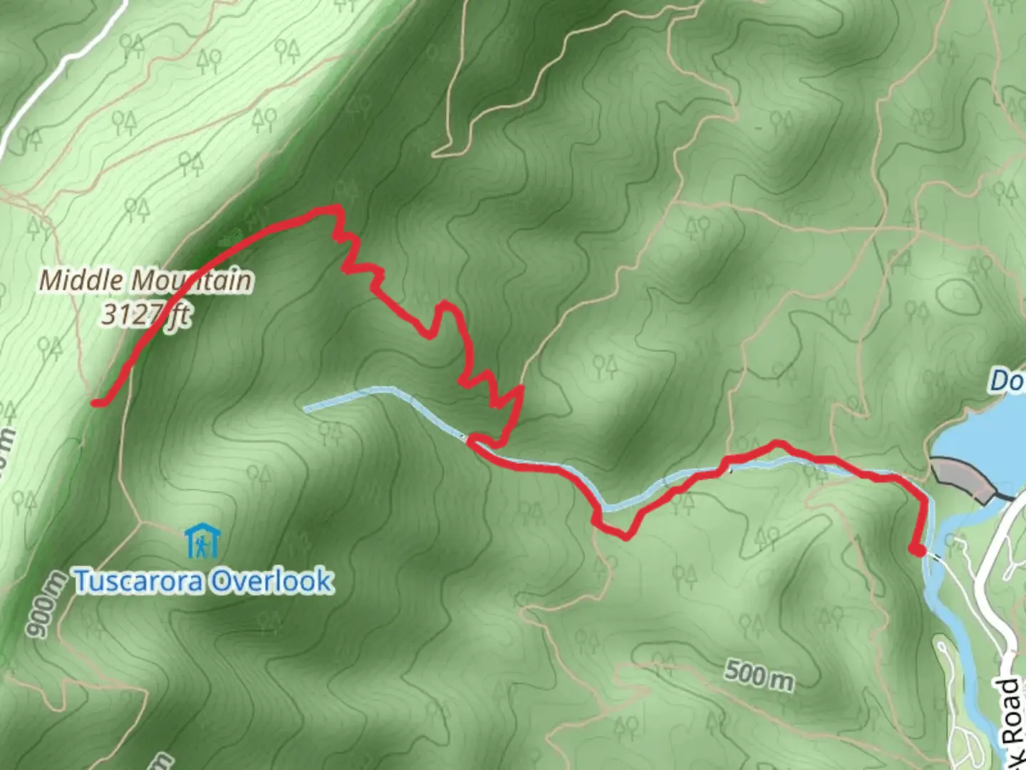 An image depicting the trail Blue Suck Falls Trail and its surrounding area.