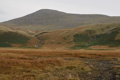 An image depicting the trail Scafell Pike via Angle Tarn - Old Dungeon Ghyll and its surrounding area.