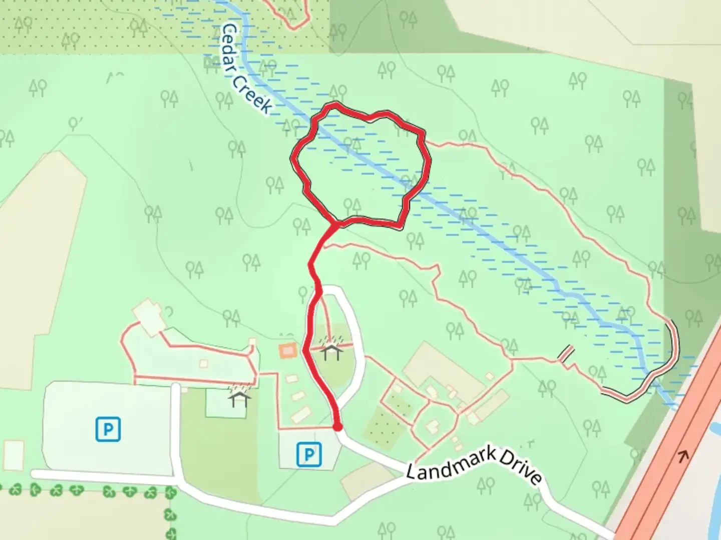 An image depicting the trail Landmark Park Loop and its surrounding area.