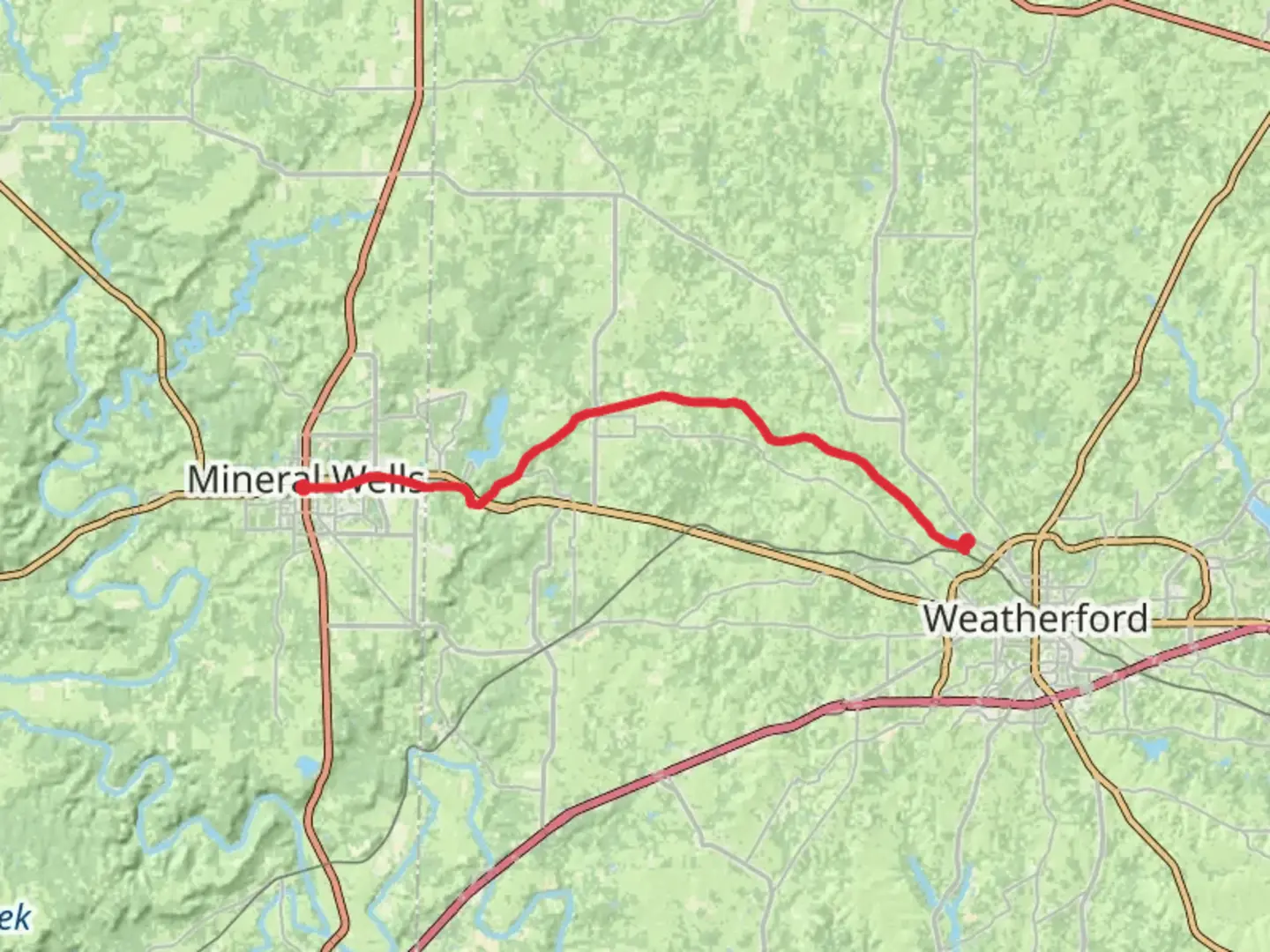 An image depicting the trail Lake Mineral Wells State Trailway and its surrounding area.