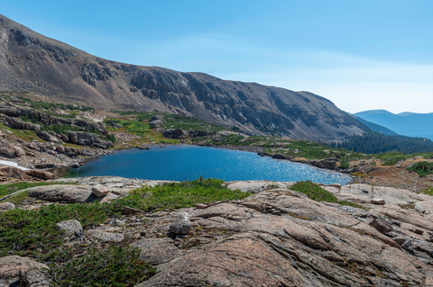 An image depicting the trail Snowbank Lake and Lion Lake via Wild Basin Trail and its surrounding area.
