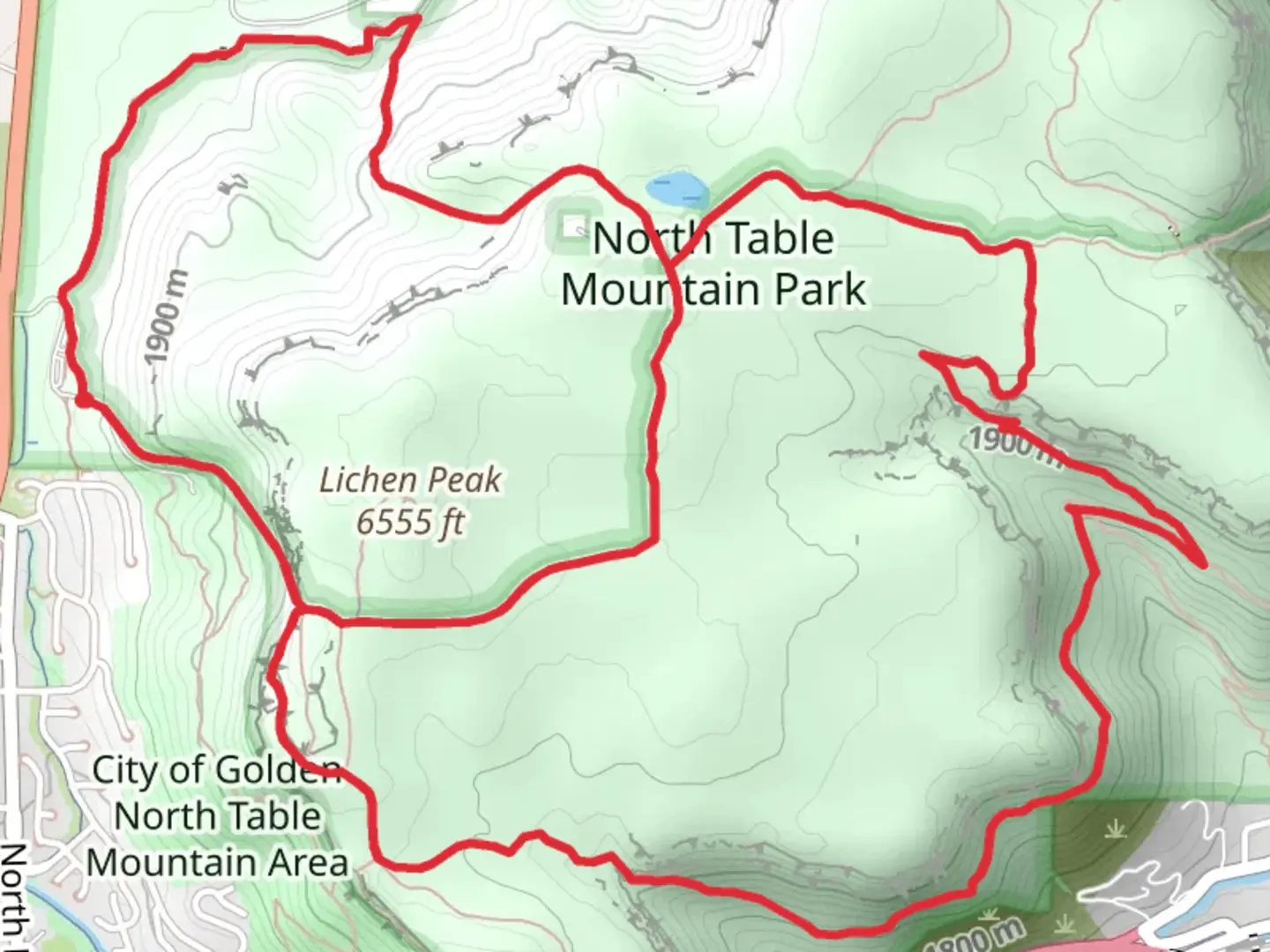 An image depicting the trail Lichen Peak Loop via North Table Loop Trail and its surrounding area.