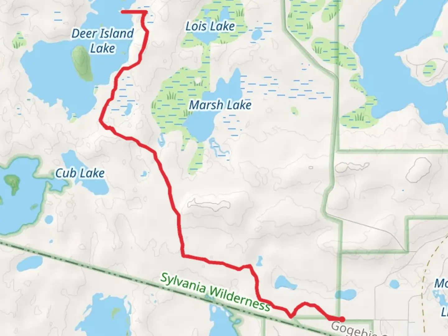 An image depicting the trail Deer Island Lake from Fisher Road and its surrounding area.