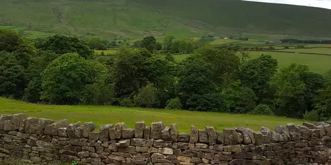 An image depicting the trail Pendle Way and its surrounding area.