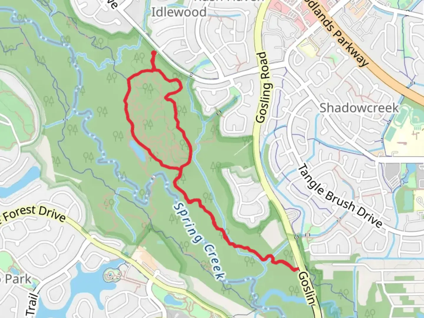 An image depicting the trail Spring Creek Nature and Fitness Loop Trail and its surrounding area.