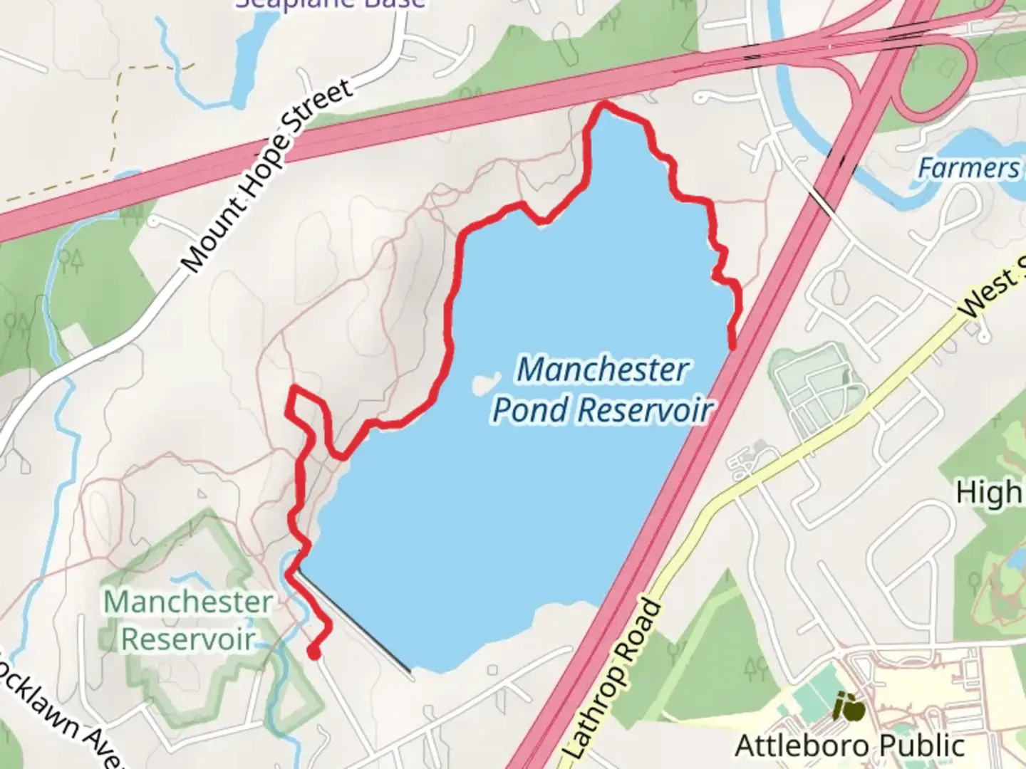 An image depicting the trail Manchester Pond from Beagle Club Road and its surrounding area.