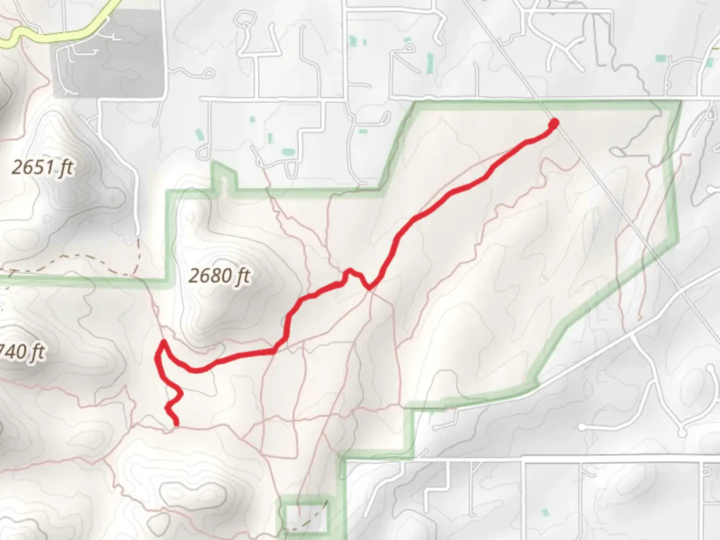 An image depicting the trail Vertical Cliffs Trail and its surrounding area.