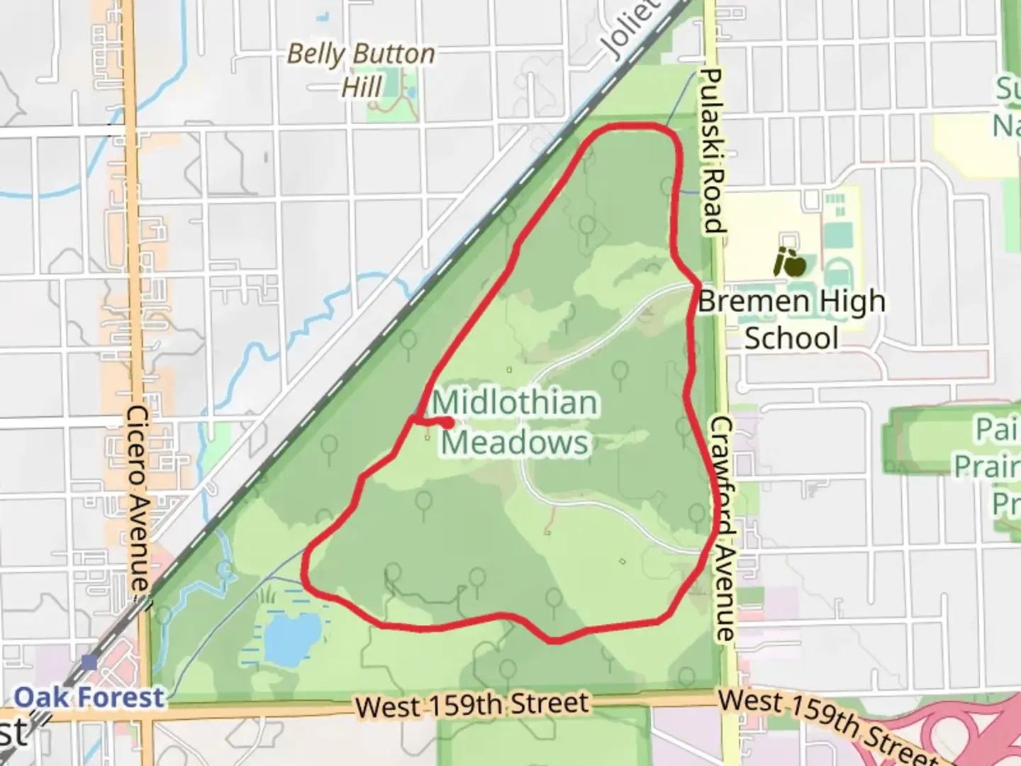 An image depicting the trail Midlothian Meadows Green Paved Loop and its surrounding area.