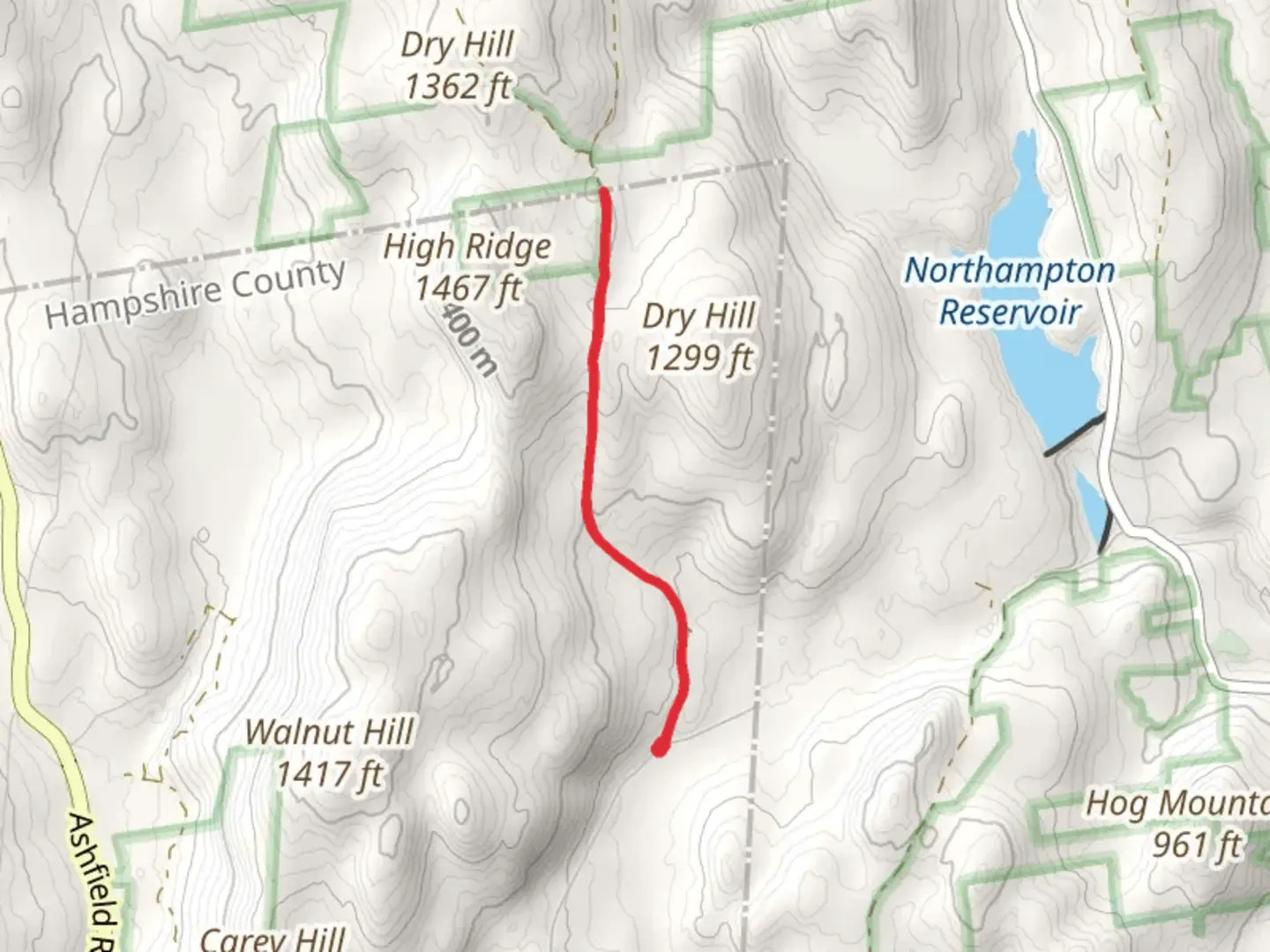 An image depicting the trail Conway State Forest from Nash Hill Road and its surrounding area.