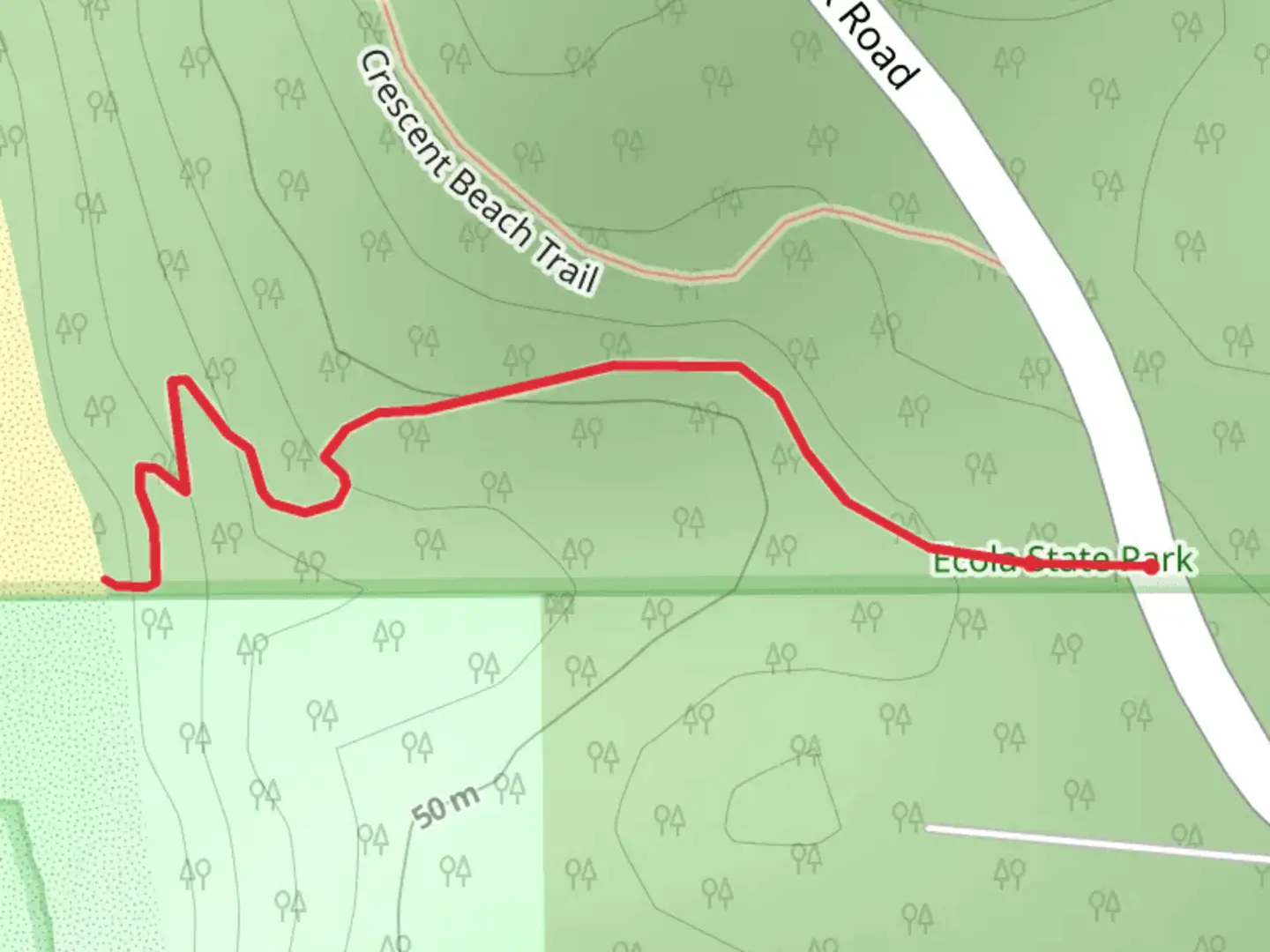 An image depicting the trail Ecola Park Road and its surrounding area.