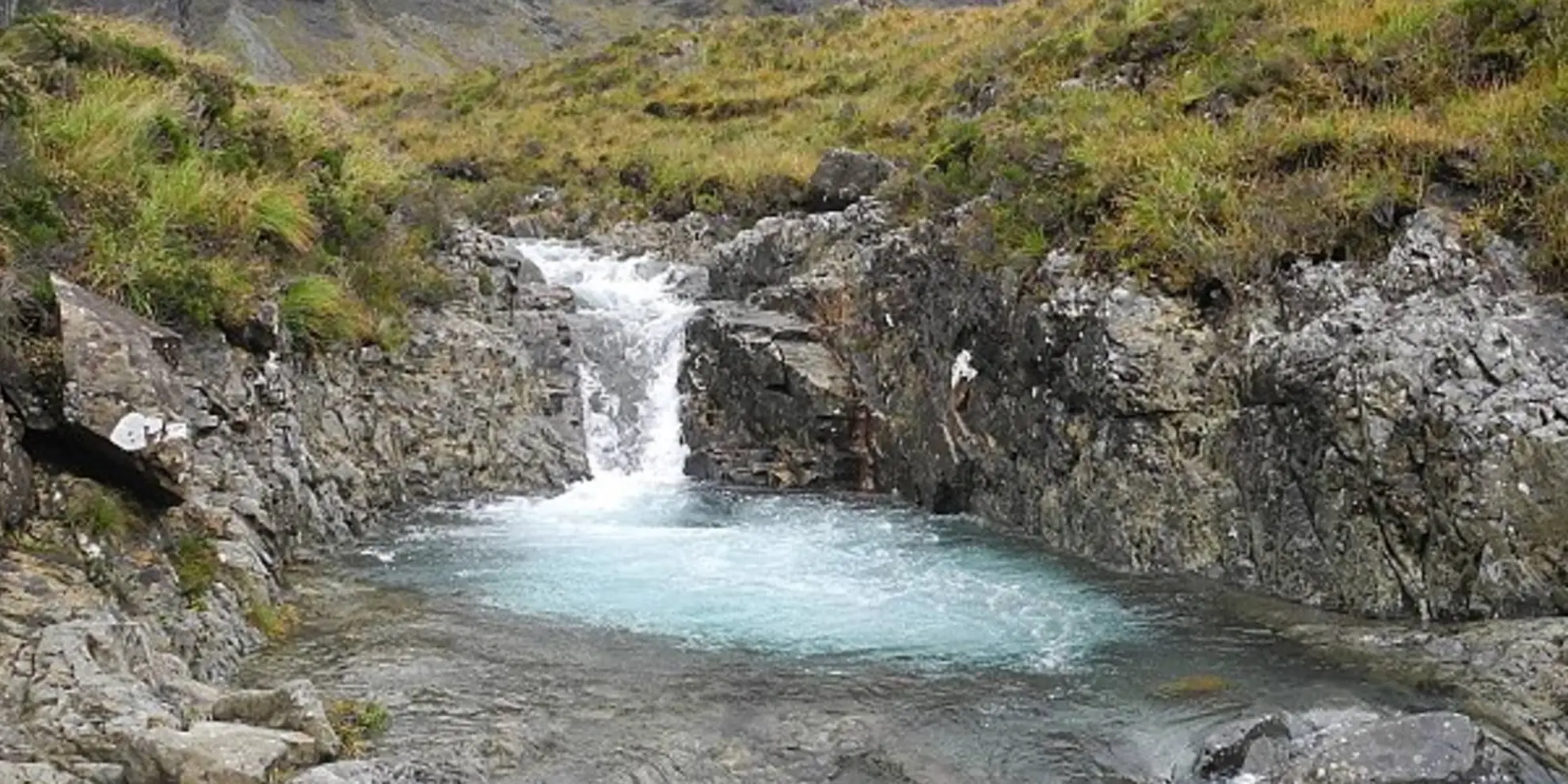 An image depicting the trail Coire na Creiche from Fairy Pools and its surrounding area.