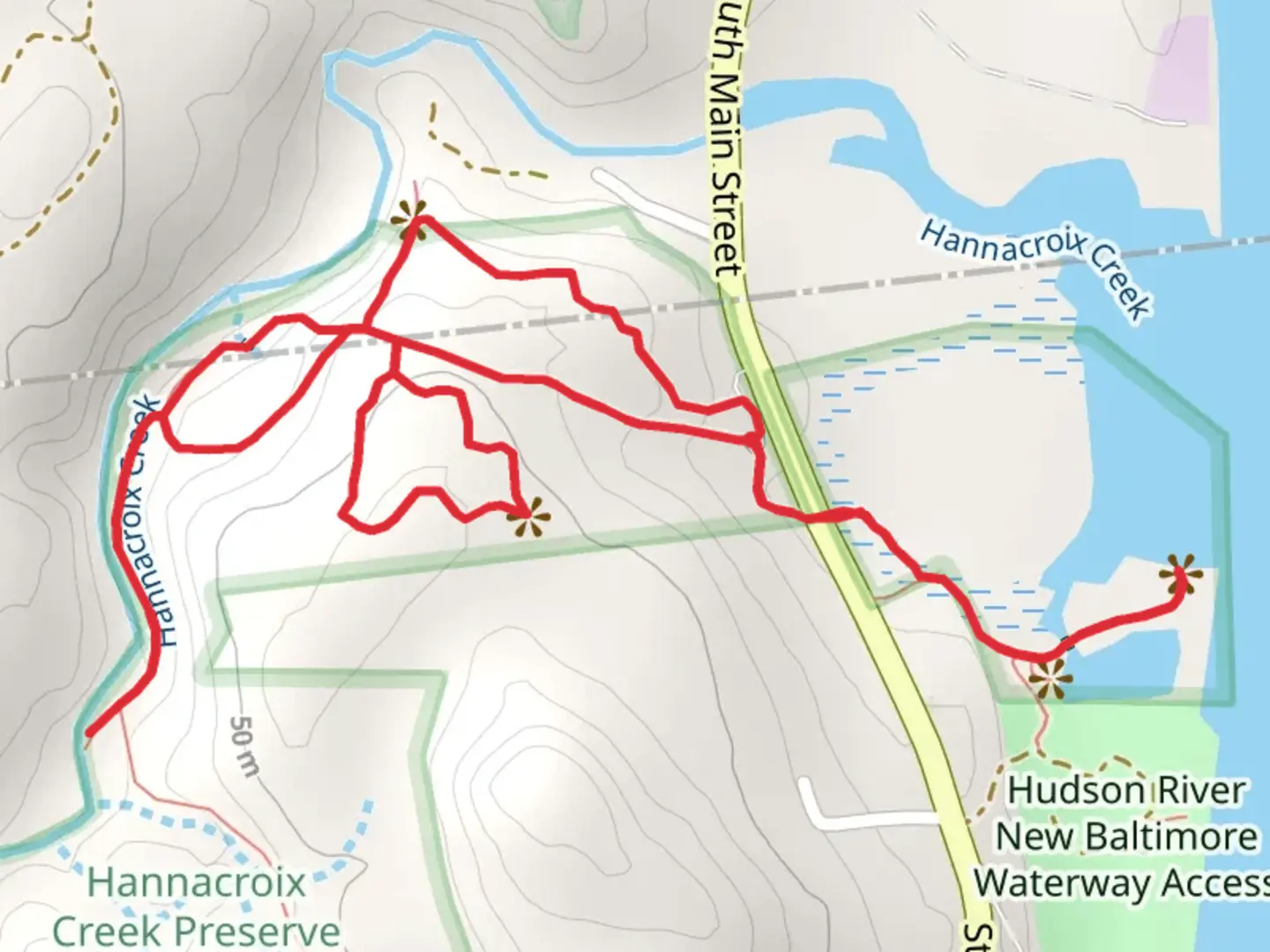 An image depicting the trail Hannacroix Creek and Falls and its surrounding area.