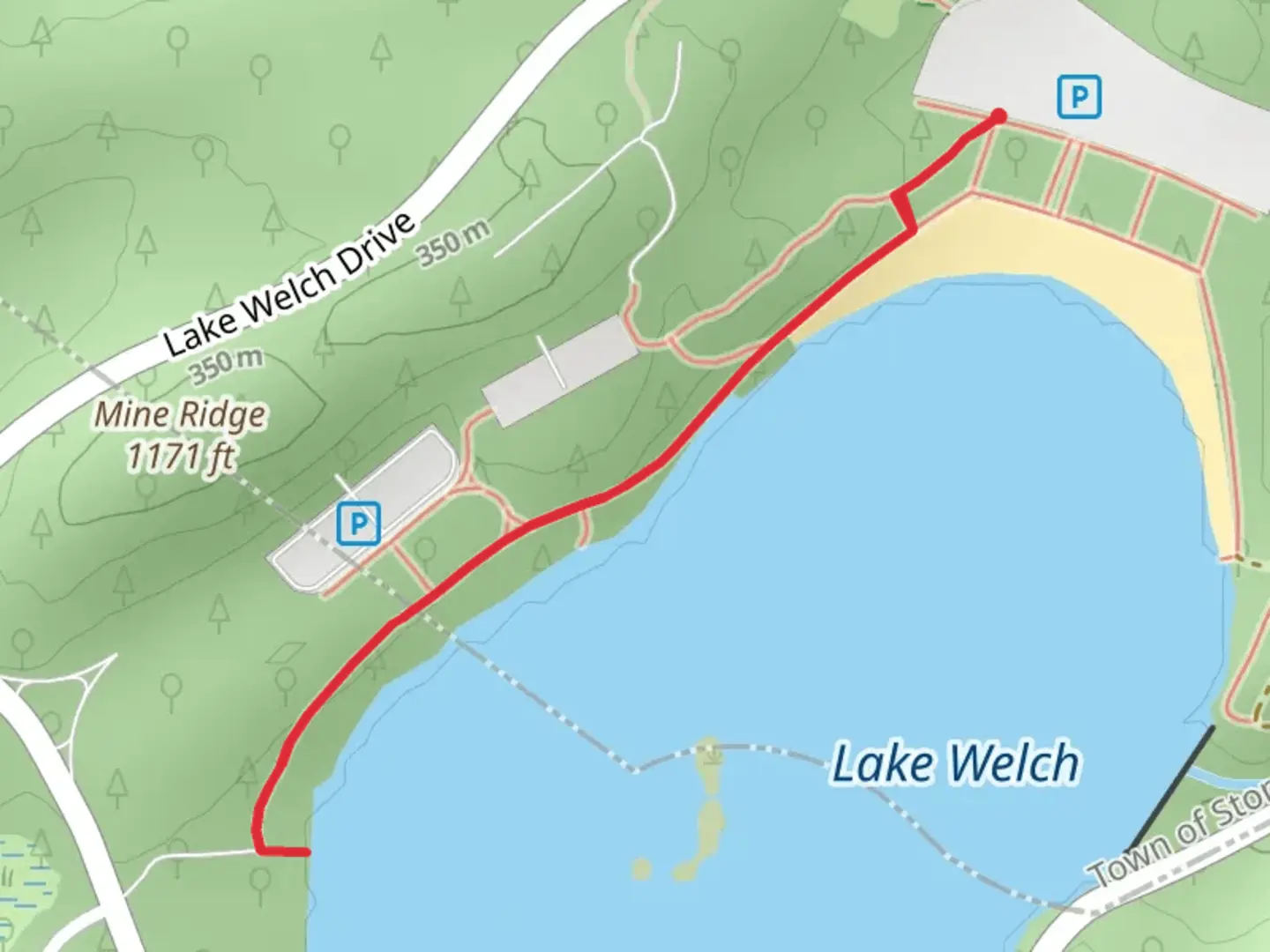 An image depicting the trail Lake Welch Beach Road Trail and its surrounding area.